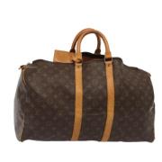 Pre-owned Canvas handbags Louis Vuitton Vintage , Brown , Dames