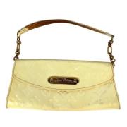 Pre-owned Leather clutches Louis Vuitton Vintage , Beige , Dames