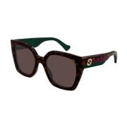 Stijlvolle zonnebril voor modefanaten Gucci , Brown , Unisex