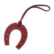 Pre-owned Fabric key-holders Hermès Vintage , Red , Dames