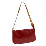 Pre-owned Leather clutches Louis Vuitton Vintage , Red , Dames