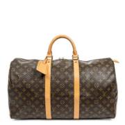 Pre-owned Coated canvas handbags Louis Vuitton Vintage , Brown , Dames