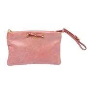 Pre-owned Leather clutches Prada Vintage , Pink , Dames