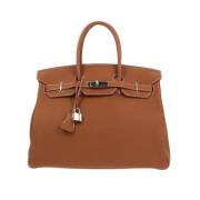 Pre-owned Leather handbags Hermès Vintage , Brown , Dames