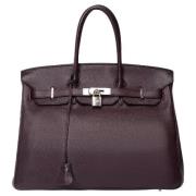 Pre-owned Leather handbags Hermès Vintage , Purple , Dames