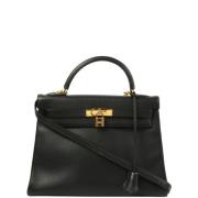 Pre-owned Canvas handbags Hermès Vintage , Black , Dames