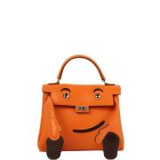 Pre-owned Canvas handbags Hermès Vintage , Orange , Dames