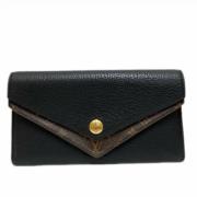 Pre-owned Leather wallets Louis Vuitton Vintage , Black , Dames