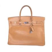 Pre-owned Canvas handbags Hermès Vintage , Brown , Dames