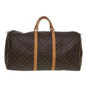 Pre-owned Canvas travel-bags Louis Vuitton Vintage , Brown , Dames