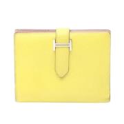 Pre-owned Leather wallets Hermès Vintage , Yellow , Dames