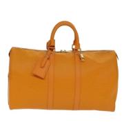 Pre-owned Leather travel-bags Louis Vuitton Vintage , Orange , Dames