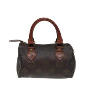 Pre-owned Canvas handbags Louis Vuitton Vintage , Brown , Dames