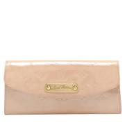 Pre-owned Leather clutches Louis Vuitton Vintage , Beige , Dames