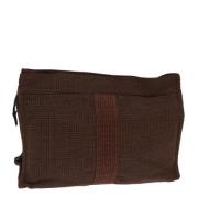 Pre-owned Canvas clutches Hermès Vintage , Brown , Dames