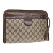 Pre-owned Leather clutches Gucci Vintage , Beige , Dames