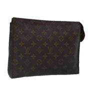 Pre-owned Canvas pouches Louis Vuitton Vintage , Brown , Dames