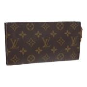 Pre-owned Canvas pouches Louis Vuitton Vintage , Brown , Dames