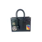 Pre-owned Leather handbags Yves Saint Laurent Vintage , Black , Dames