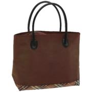 Pre-owned Nylon handbags Burberry Vintage , Brown , Dames