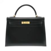 Pre-owned Leather handbags Hermès Vintage , Black , Dames