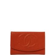 Pre-owned Leather wallets Chanel Vintage , Orange , Dames