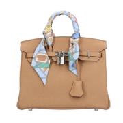 Pre-owned Leather handbags Hermès Vintage , Beige , Dames