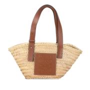 Pre-owned Raffia totes Loewe Pre-owned , Beige , Dames