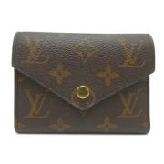 Pre-owned Fabric wallets Louis Vuitton Vintage , Brown , Dames