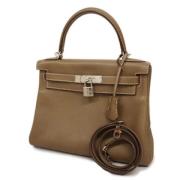 Pre-owned Leather handbags Hermès Vintage , Brown , Dames