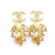 Pre-owned Fabric earrings Chanel Vintage , Yellow , Dames