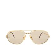 Pre-owned Metal sunglasses Cartier Vintage , Yellow , Dames