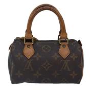 Pre-owned Canvas handbags Louis Vuitton Vintage , Brown , Dames