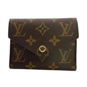 Pre-owned Fabric wallets Louis Vuitton Vintage , Brown , Dames