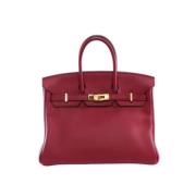 Pre-owned Leather handbags Hermès Vintage , Red , Dames