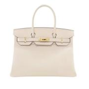 Pre-owned Leather handbags Hermès Vintage , Beige , Dames