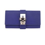 Pre-owned Leather clutches Hermès Vintage , Blue , Dames