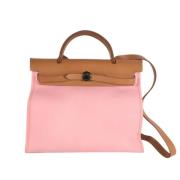 Pre-owned Leather handbags Hermès Vintage , Pink , Dames