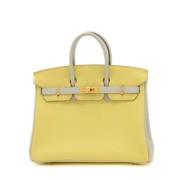 Pre-owned Leather handbags Hermès Vintage , Yellow , Dames