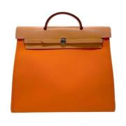 Pre-owned Leather handbags Hermès Vintage , Orange , Dames