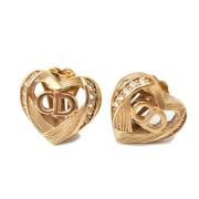 Pre-owned Metal earrings Dior Vintage , Yellow , Dames