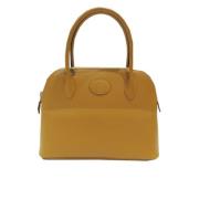 Pre-owned Leather handbags Hermès Vintage , Yellow , Dames