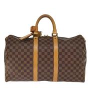 Pre-owned Canvas handbags Louis Vuitton Vintage , Brown , Dames