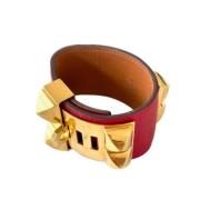 Pre-owned Leather bracelets Hermès Vintage , Orange , Dames