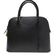 Pre-owned Leather handbags Hermès Vintage , Black , Dames