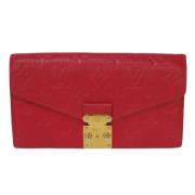 Pre-owned Leather wallets Louis Vuitton Vintage , Red , Dames