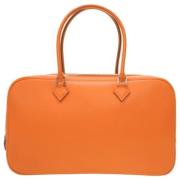 Pre-owned Leather handbags Hermès Vintage , Orange , Dames