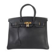 Pre-owned Leather handbags Hermès Vintage , Black , Dames