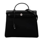 Pre-owned Canvas handbags Hermès Vintage , Black , Dames