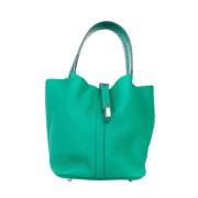 Pre-owned Fabric handbags Hermès Vintage , Green , Dames